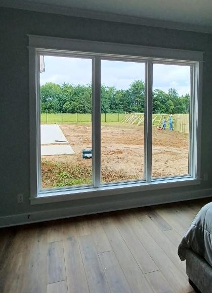 Roller Shades in a Master Bed on Country Meadows in Bullard, TX